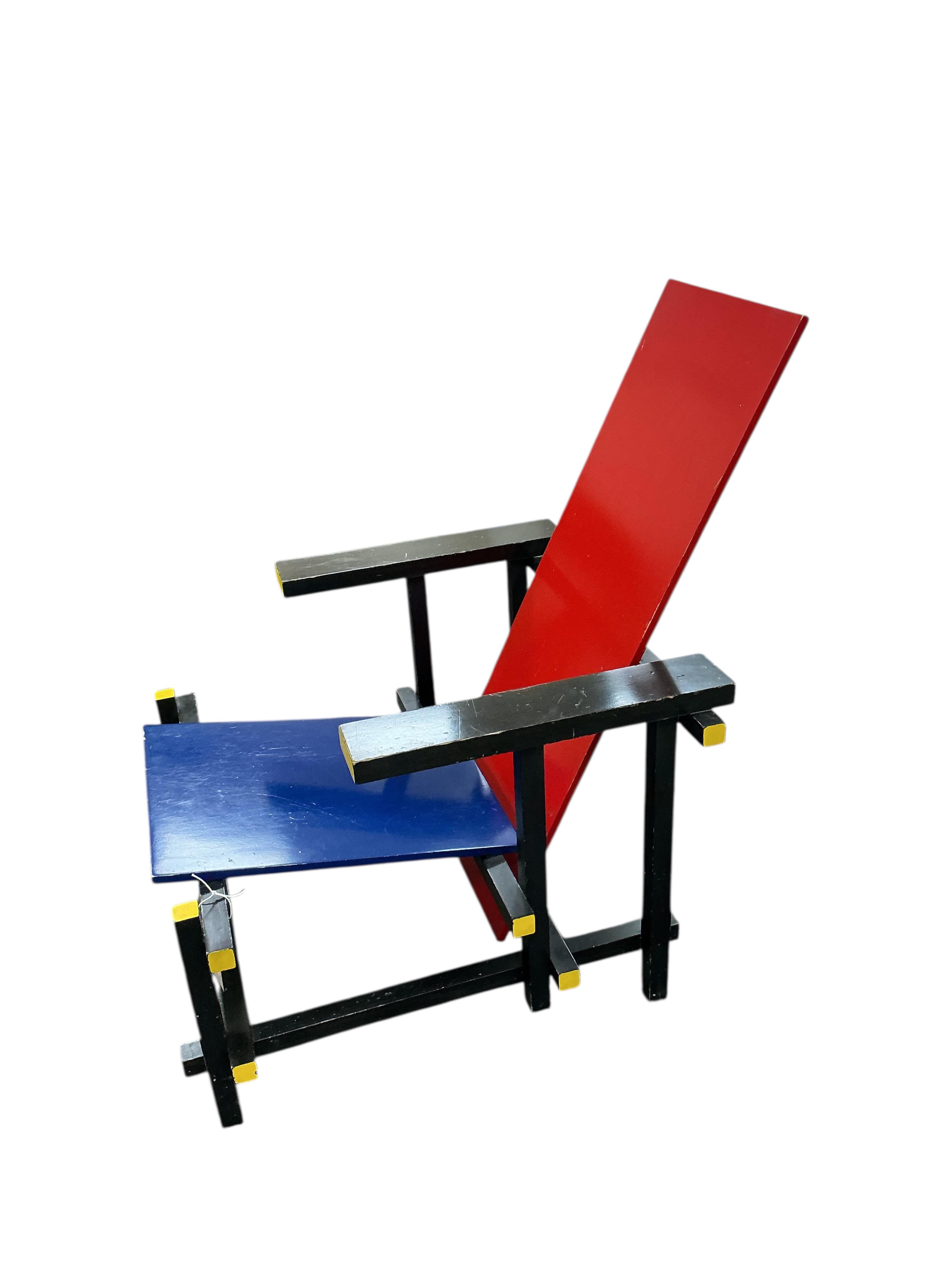 A red and blue chair by Gerrit Rietveld for cassina